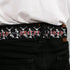 Grateful Dead - GRATEFUL DEAD Text with Steal Your Face Logo Full Color Black Seatbelt Belt - GRATEFUL DEAD Dancing Skeletons and Text Black/White/Red Webbing - StealieShop